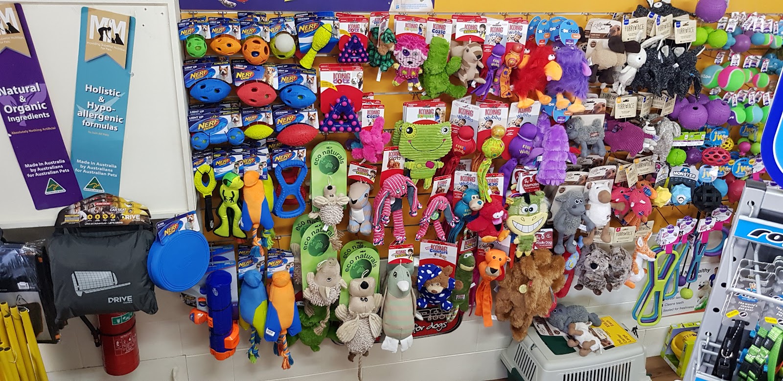 A wall of dog toys